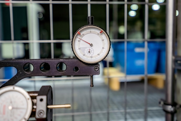 Photo high low pressure gauges mounted on the plate measuring instruments for refrigerant pressure control industrial measuring