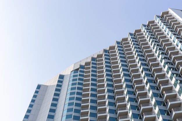 High modern hotel building on blue sky 