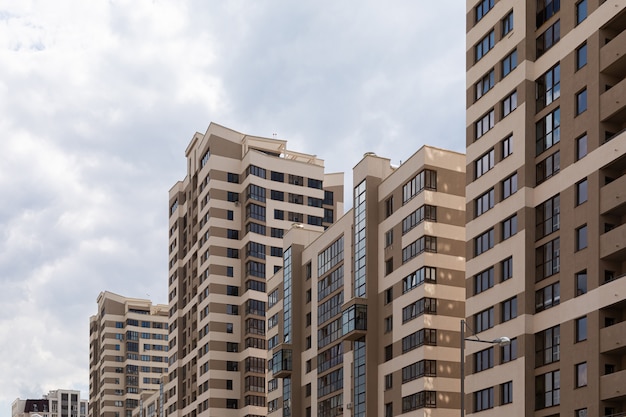 High modern luxury apartment in downtown, brown and beige tiled facade. 