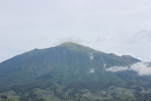 high mountain with cloudy sky