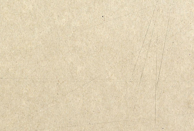 High res paperboard paper texture background gray beige with knife marks or scratches small particle