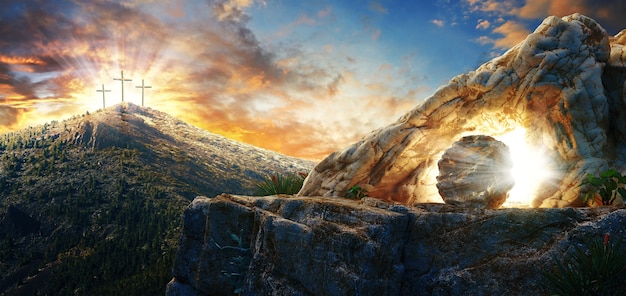 High resolution. Easter Sunday concept: Empty tomb stone with cross on meadow sunrise. 3d rendering