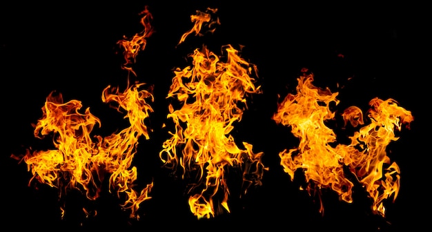 High resolution fire flames from torch, isolated on black wall