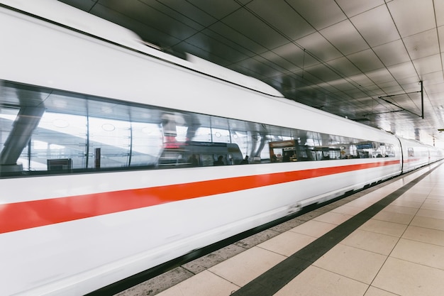 High speed train in motion on railway station