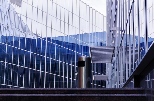 High-tech style cityscape, fragment of glass and metal building facades