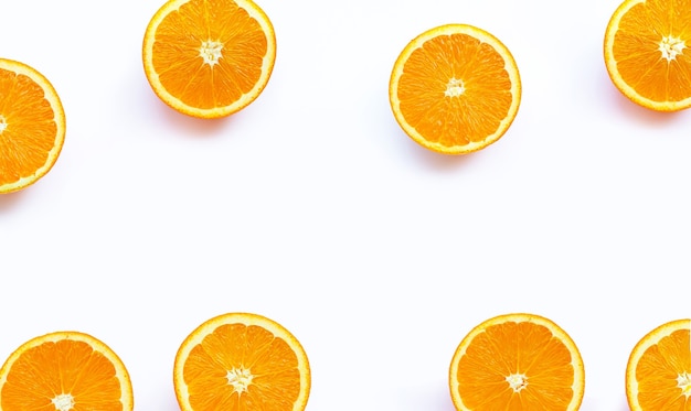 High vitamin C, Juicy and sweet. Frame made of fresh orange fruit on white background.