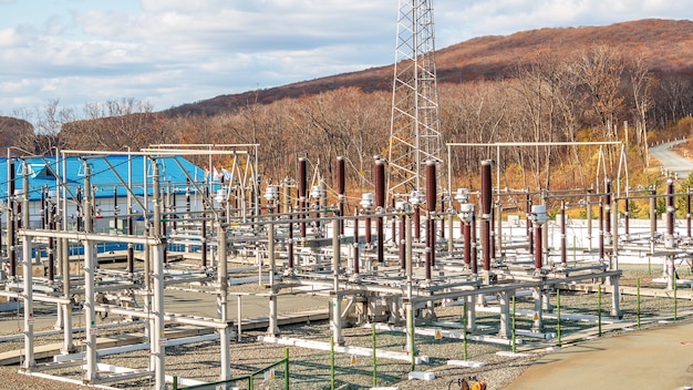 High voltage electric power substation in the open. Industrial facility.