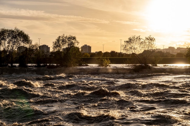 Photo high water of sava river during flooding of the embankment on the outskirts of zagreb city croatia