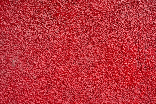 Highly detailed red color stucco wall background