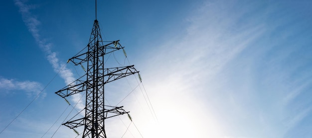 highvoltage pole wires power lines at sunset or sunrise electricity distribution station