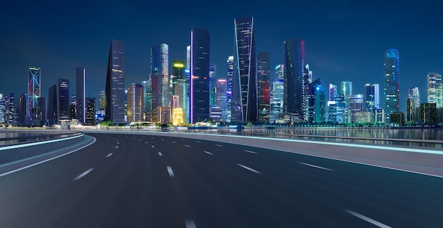 Highway overpass motion blur with cityscape skyline