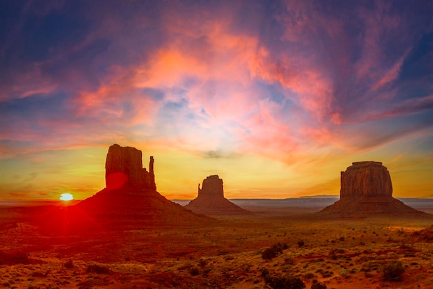 Highway reaching Monument Valley at sunset Utah United States