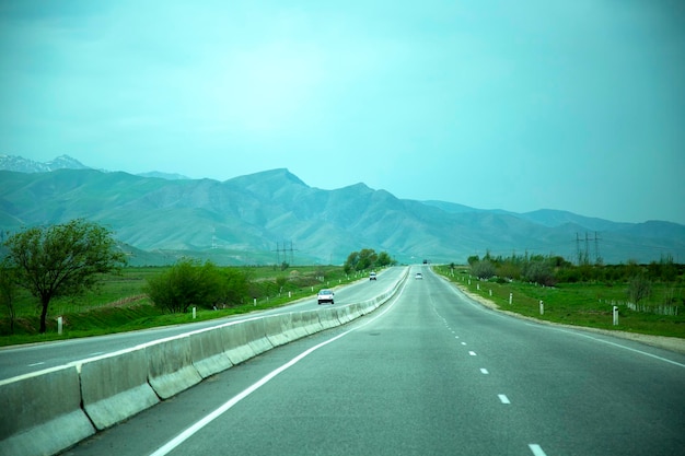 Highway through the green plains