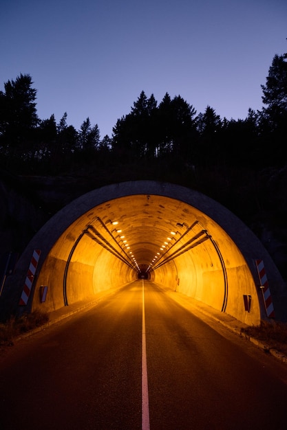 Highway tunnel entrance at night