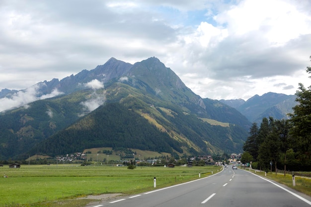 A highway in a valley in the middle of majestic mountains Hiking travel outdoor concept journey in the mountains Kals am Grossglockner Austria