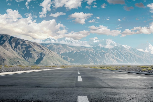 Highway with mountains and sky in background