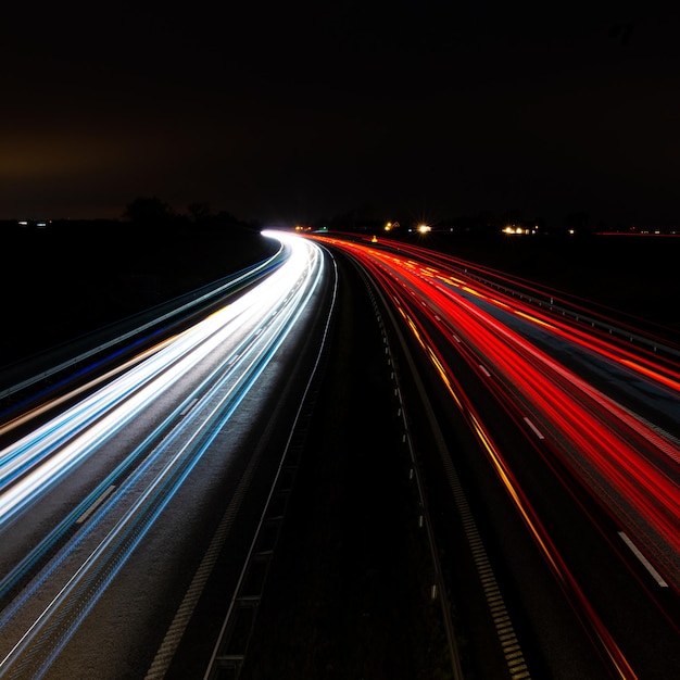 Highway with white and red illuminations at night