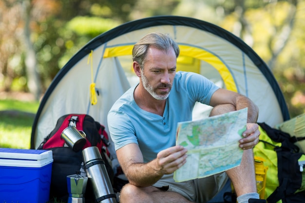 Hiker looking at map