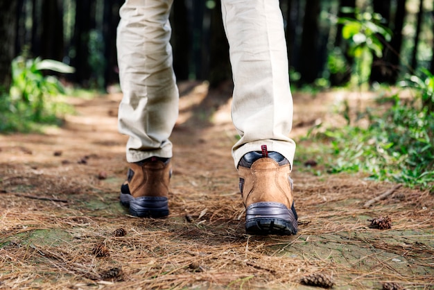 Hiker man with boots walking