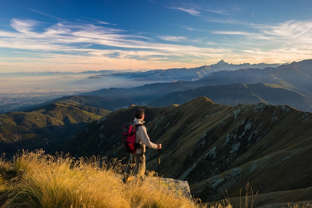 Hiker resting on the mountain top