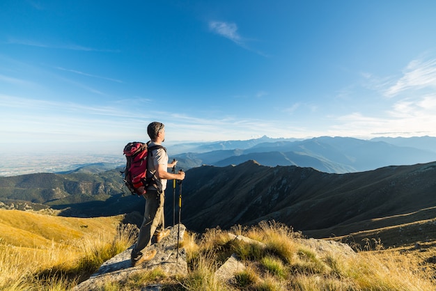 Hiker resting on the mountain top