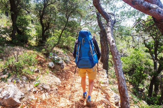 Hiking in famous Lycian Way in the Turkey. Backpacker in the trail.