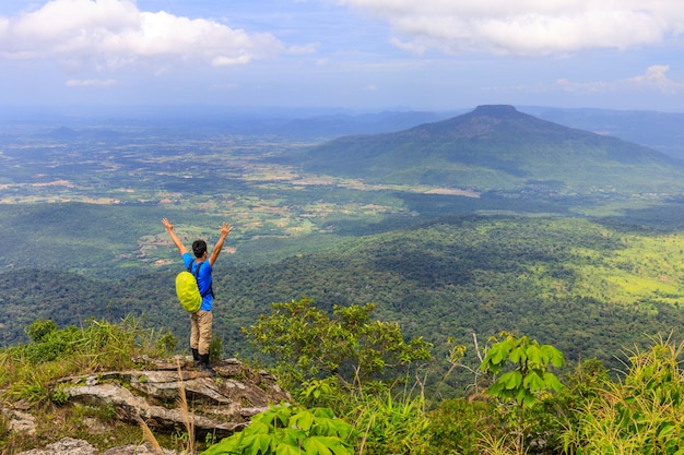 The hiking man touring on  high mountain in Loei province, Thailand.