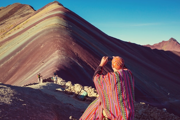 Hiking scene in Vinicunca, Cusco Region, Peru. Montana de Siete Colores,  Rainbow Mountain.