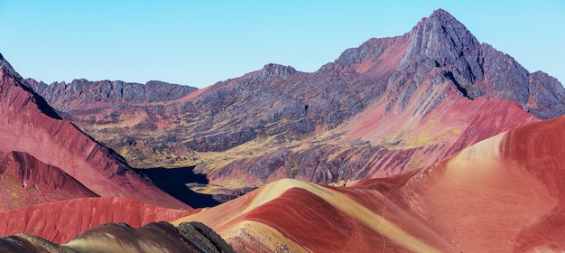 Hiking scene in Vinicunca, Cusco Region, Peru. Montana de Siete Colores,  Rainbow Mountain.