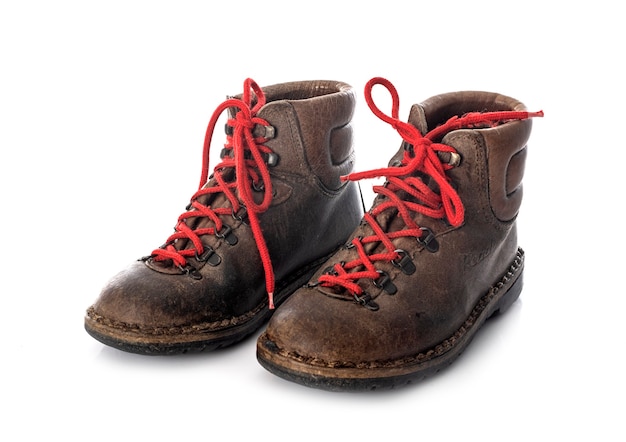 Hiking shoes in front of white background