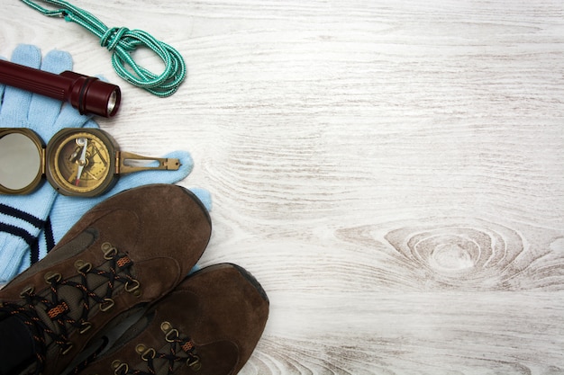 Hiking supplies on white wooden