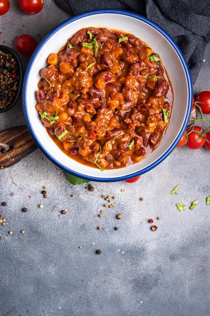 hili con carne beans, corn, meat, tomato healthy meal food snack on the table copy space food