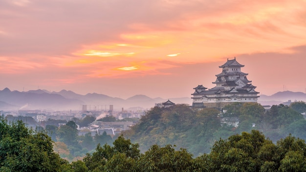 Himeji Castle in the autumn in Japan at sunrise.