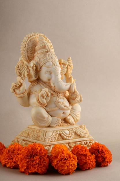 Hindu God Ganesha. Ganesha Idol on background