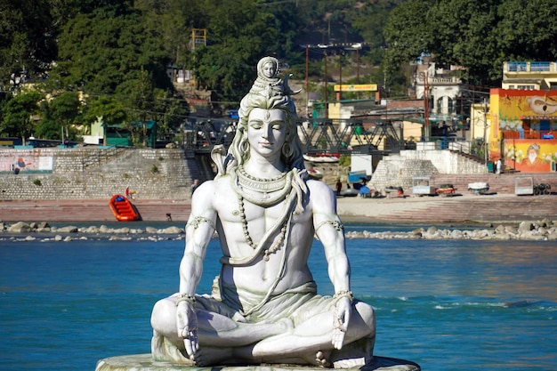 Hindu God Shiv Statue in the bank of the river in Rishikesh