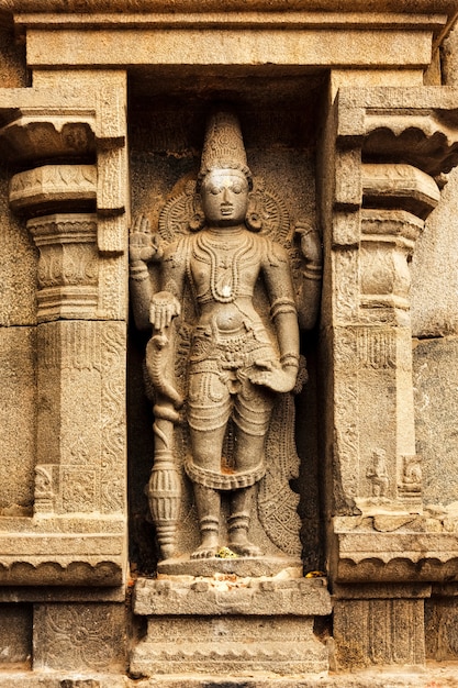 Hindu god vishnu bas relief in hindu temple in india