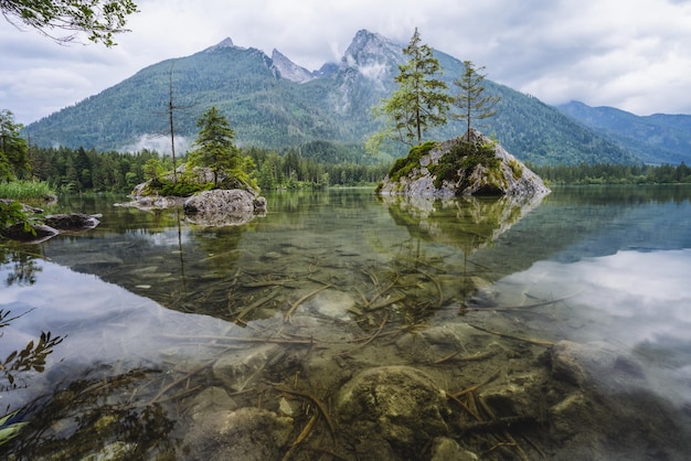 Hintersee Lake with reflection of Watzmann mountain peaks Ramsau Berchtesgaden Bavaria Germany Europ