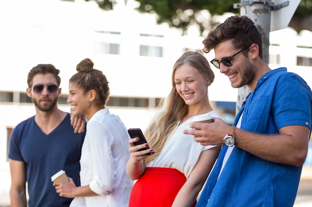 Hip friends spending time together outdoors