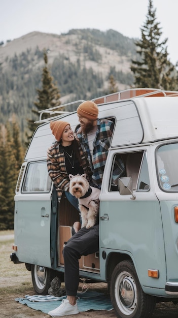 Photo hipster couple with cute pet traveling together on vintage rv campervan