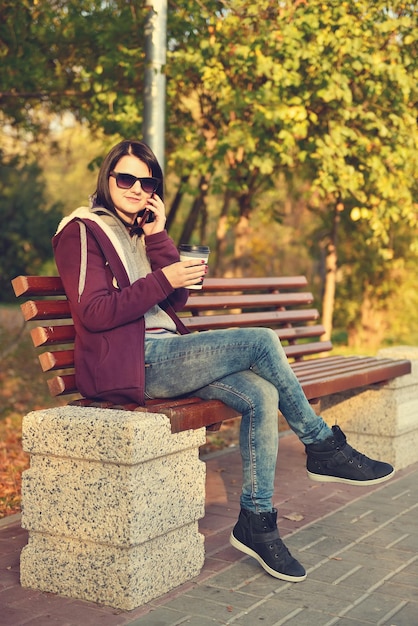 Hipster girl talking on phone