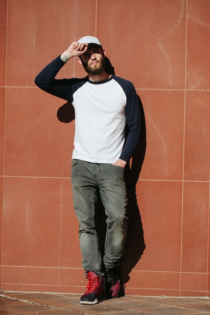 Hipster wearing white blank t-shirt with space for your logo