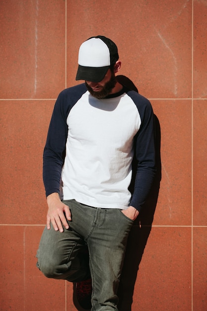 Hipster wearing white blank t-shirt with space for your logo