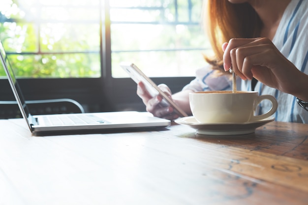 Hipster woman using mobile laptop