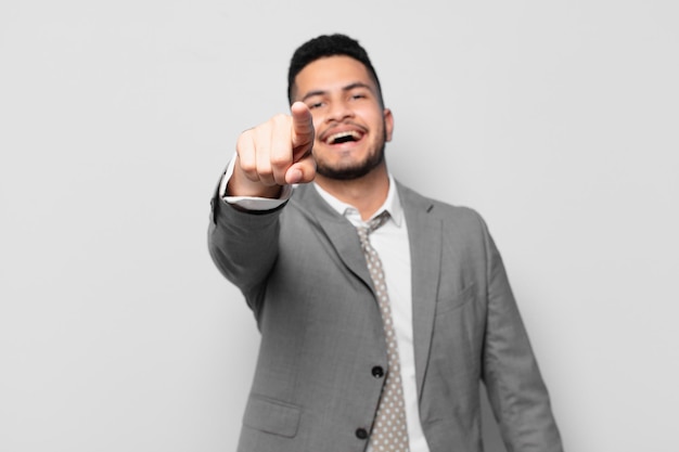 hispanic businessman pointing or showing