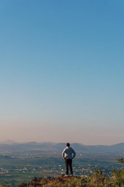 Hispanic male hiking in mountains