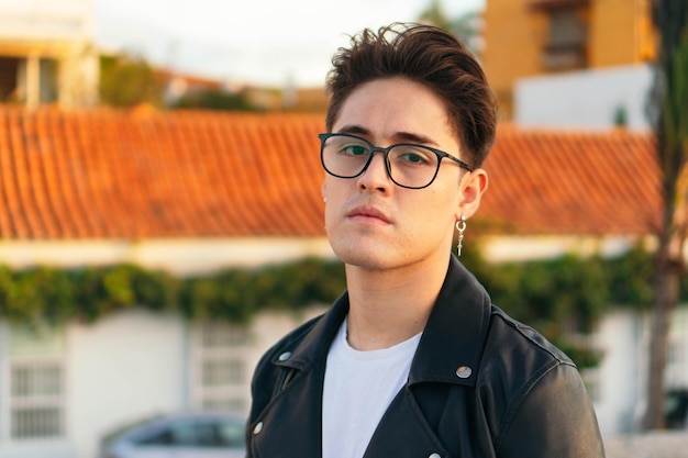 Hispanic Man Wearing Glasses Looking At The Camera