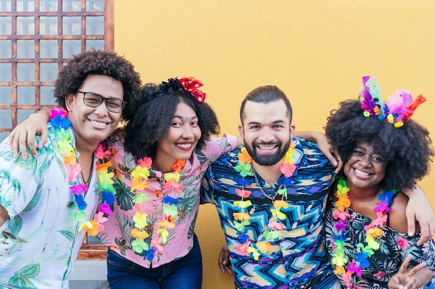 Hispanic tourists enjoying Carnaval in the street