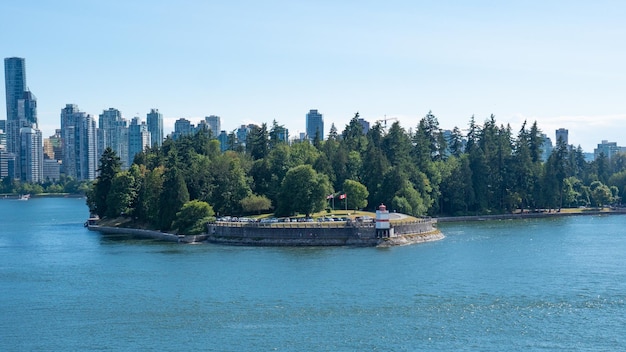 Historic Brockton Point Lighthouse landmark in scenic Stanley Park viewed from sea