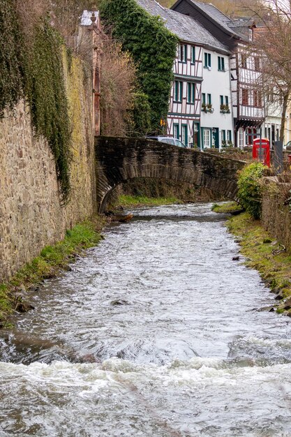 Historic buildings and erft river in bad muenstereifel germany