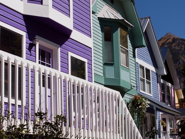 Historical Dollhouse Row in Telluride, Colorado. Each house is painted with bright colors.